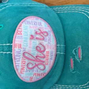 Distressed cap "She is" NWT